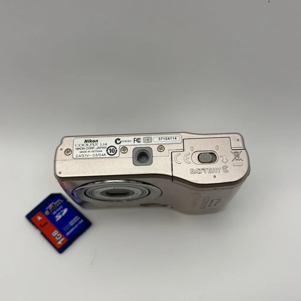 Nikon Coolpix L14 7.1 Megapixel Digital Camera Silver W/ 1gb Mem Card - Tested